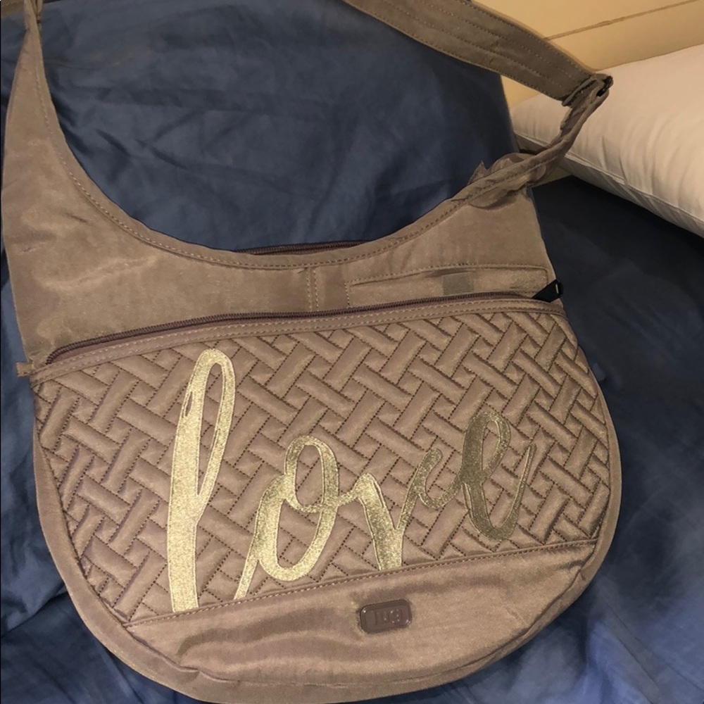 Lug crossbody